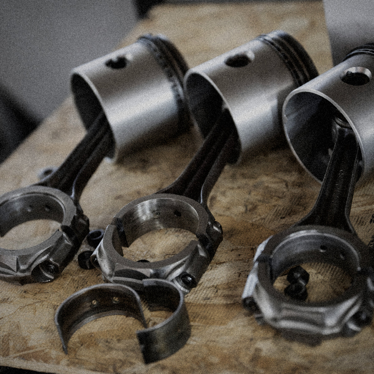 Vintage Technologies: pistons and connecting rods on a workbench
